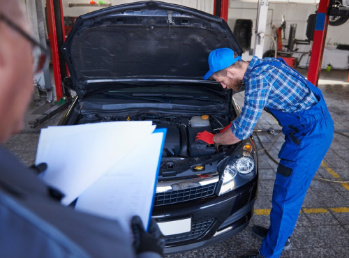 ACT Roadworthy Inspection mechanic checking engine with checklist
